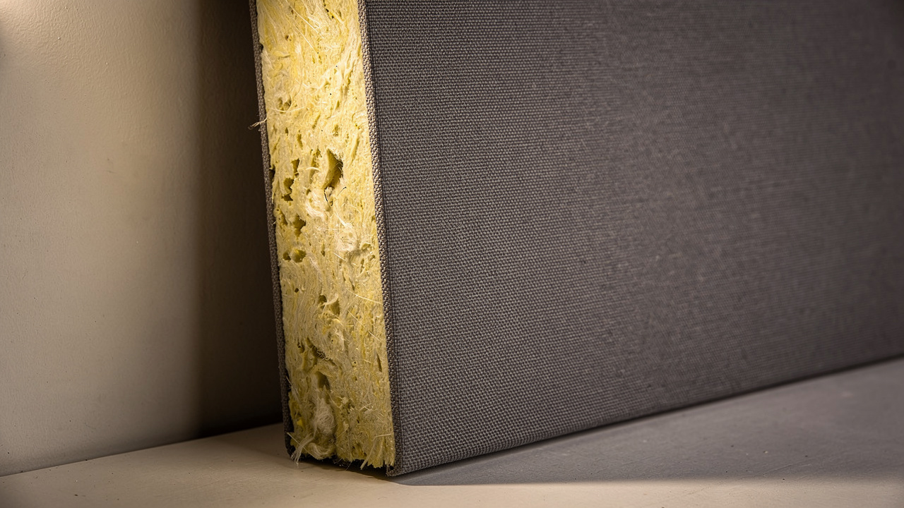 Cross-section of acoustic wall panel showing inner core layers