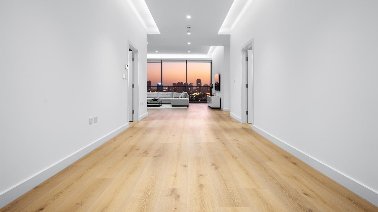Newly installed acoustic flooring in a finished UAE apartment hallway