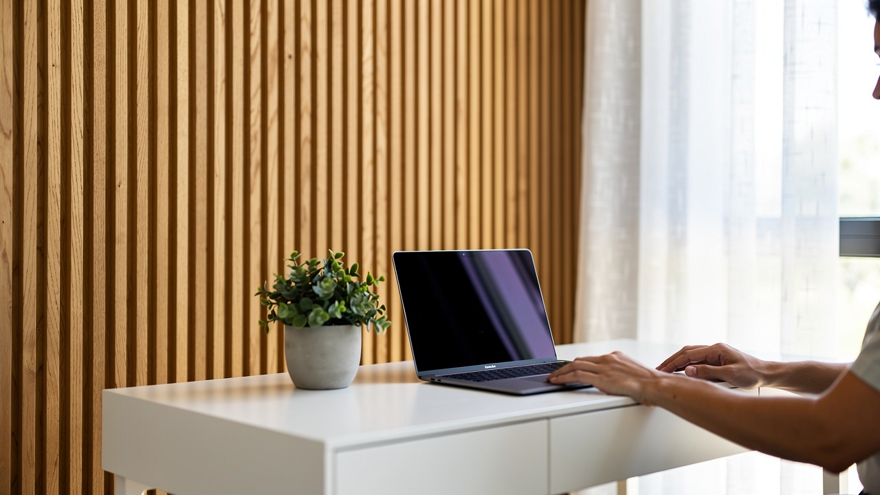 Calm Dubai home office with slatted acoustic wood panel wall