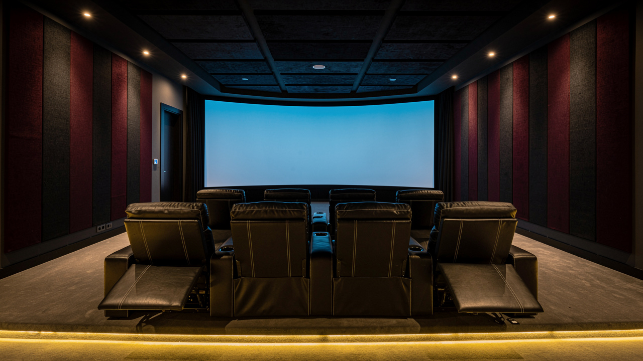 Home theater room with acoustic fabric panels in UAE villa