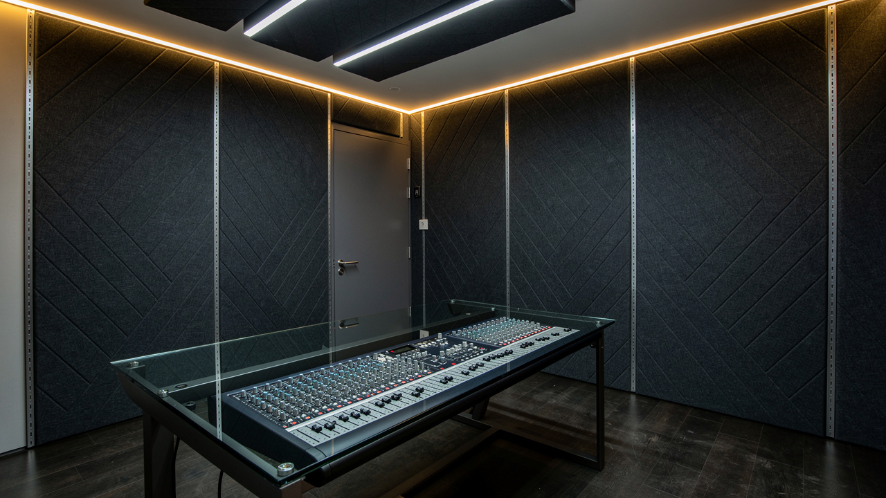 Professional recording studio with PVC track acoustic fabric walls